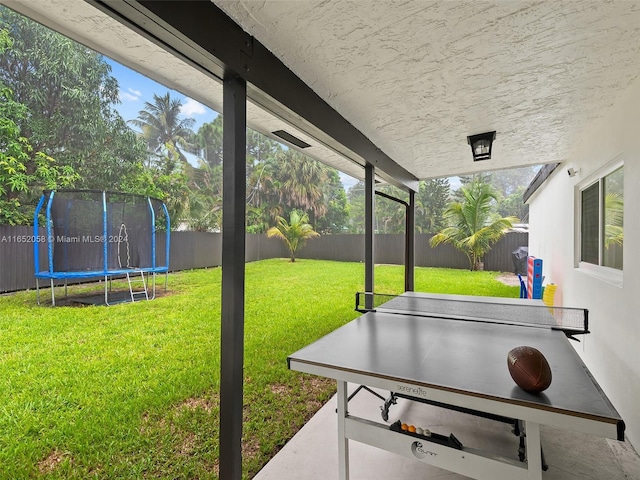 2320 SW 36th Ave, Fort Lauderdale, FL 33312 - view of yard featuring a trampoline and a fenced backyard