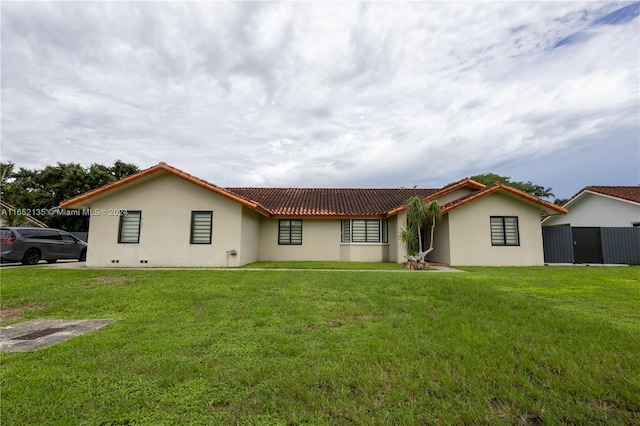 view of front of house with a front yard