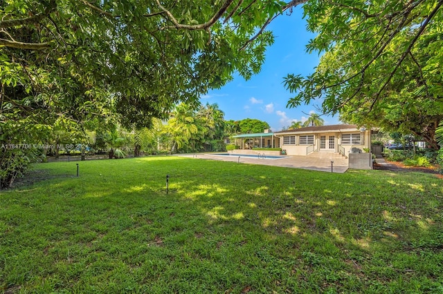 view of yard with a patio area