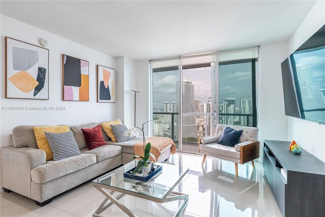 tiled living room with expansive windows