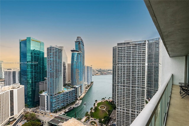 property's view of city featuring a water view