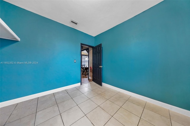 view of tiled spare room