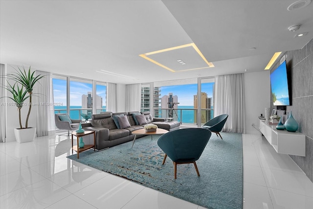 tiled living room featuring expansive windows