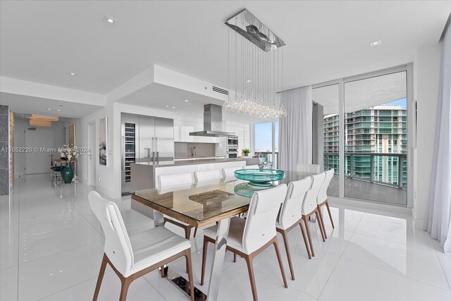 16500 Collins Ave Unit 2451, Sunny Isles Beach, FL 33160 - dining space featuring floor to ceiling windows, light tile patterned floors, and recessed lighting