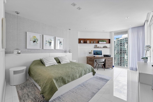 bedroom with light tile patterned flooring