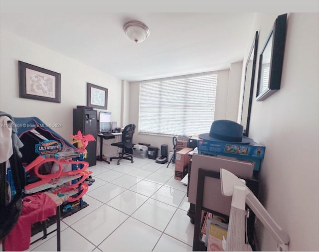 5700 Collins Ave Unit 8B, Miami Beach, FL 33140 - office area featuring light tile patterned flooring