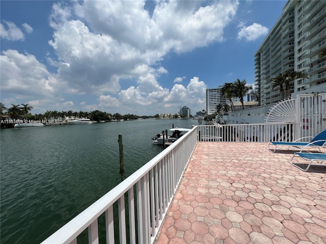 exterior space with a boat dock and a water view