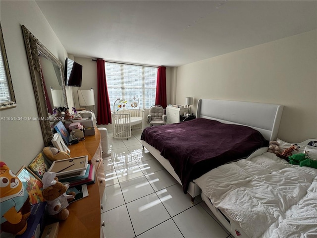 5700 Collins Ave Unit 8B, Miami Beach, FL 33140 - bedroom featuring light tile patterned floors
