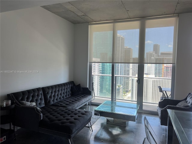151 SE 1st St Unit 3109, Miami, FL 33131 - living room featuring finished concrete floors and floor to ceiling windows
