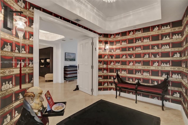 sitting room featuring crown molding and tile patterned flooring