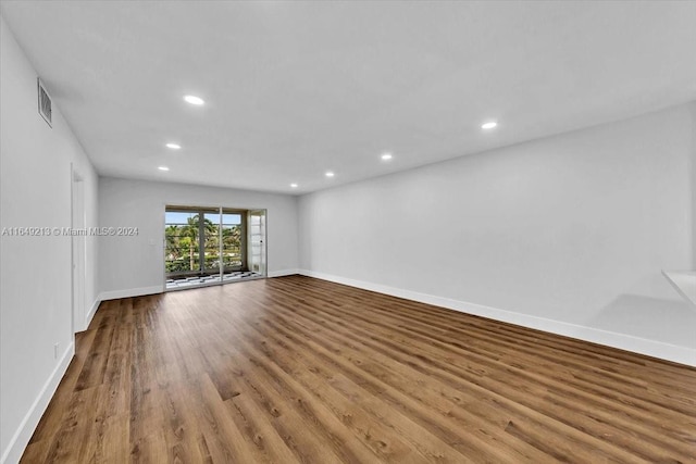 unfurnished room with light hardwood / wood-style floors