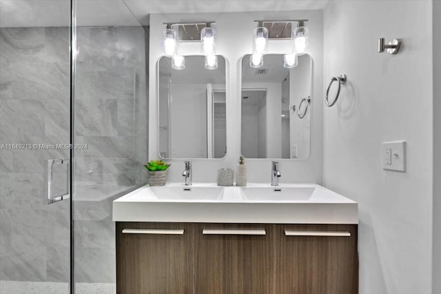 bathroom with vanity and an enclosed shower