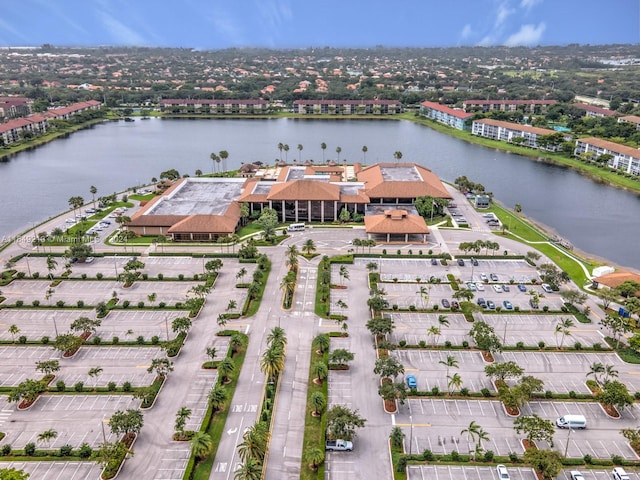 drone / aerial view with a water view