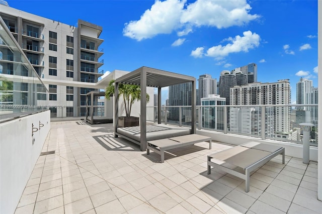 view of patio with a balcony