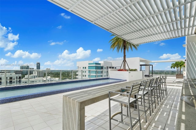 view of patio featuring a balcony