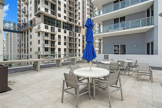 view of patio with a balcony