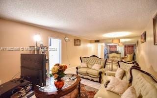 living room with a textured ceiling