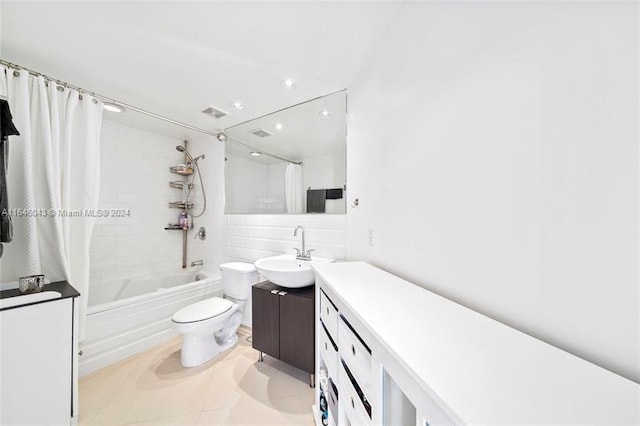 full bathroom with tile patterned flooring, backsplash, toilet, shower / tub combo with curtain, and vanity