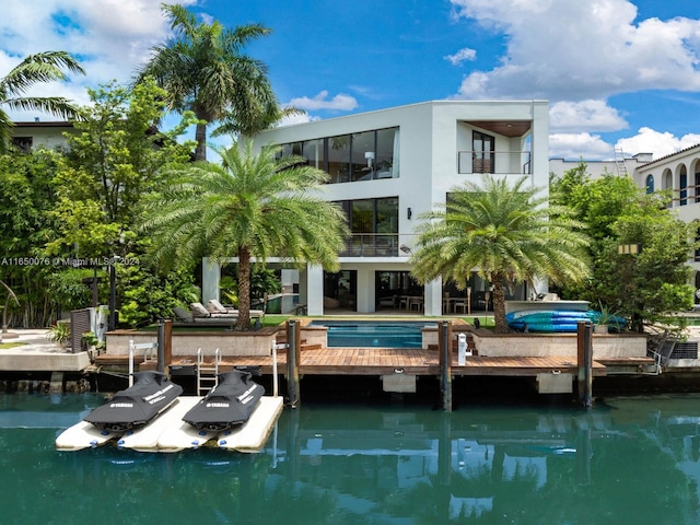 dock area with a water view