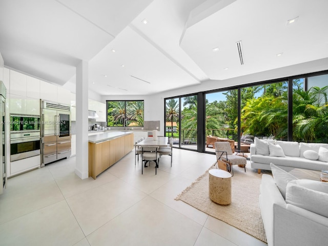 living room with light tile patterned floors