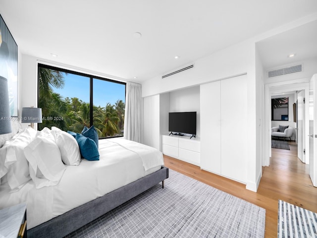 bedroom featuring light wood-type flooring