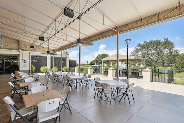 view of patio / terrace featuring ceiling fan