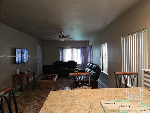 living room with ceiling fan