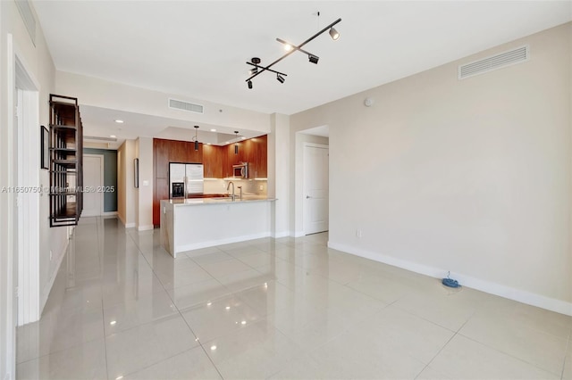 315 NE 3rd Ave Unit 1505, Fort Lauderdale, FL 33301 - unfurnished living room featuring light tile patterned floors and baseboards