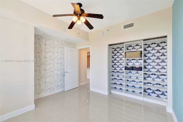 315 NE 3rd Ave Unit 1505, Fort Lauderdale, FL 33301 - spare room with a ceiling fan and light tile patterned floors