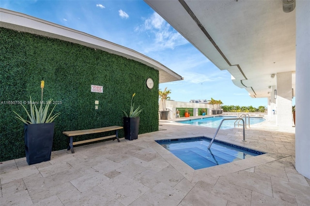 315 NE 3rd Ave Unit 1505, Fort Lauderdale, FL 33301 - community pool with a hot tub and a patio