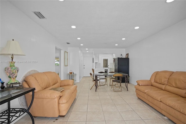 living room with light tile patterned floors