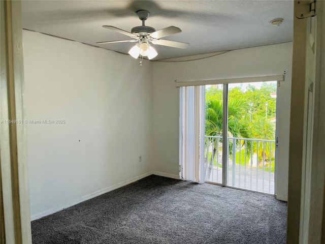 empty room with ceiling fan and carpet flooring