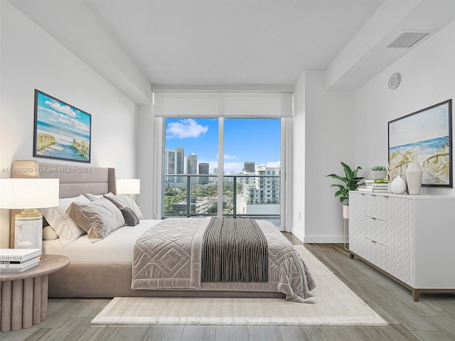 bedroom featuring hardwood / wood-style flooring