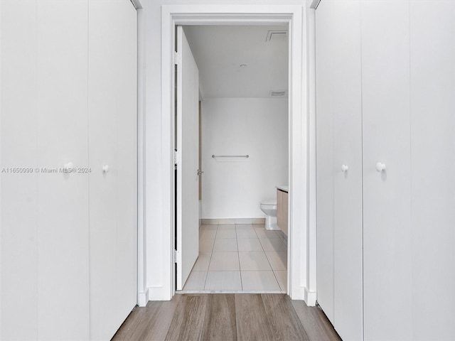 hallway featuring light wood-type flooring