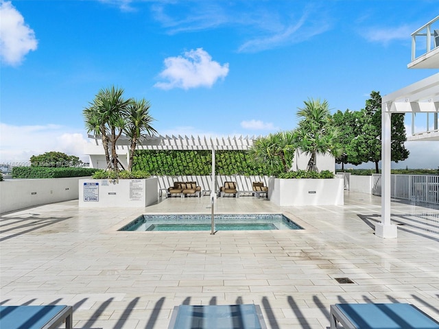 view of swimming pool with a pergola, a community hot tub, and a patio