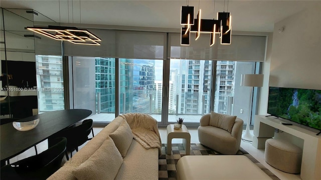 living room featuring a notable chandelier