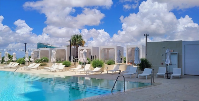 view of swimming pool featuring a patio