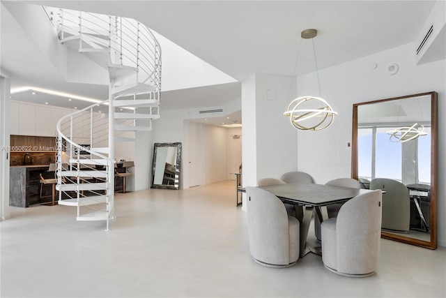 dining room featuring a notable chandelier