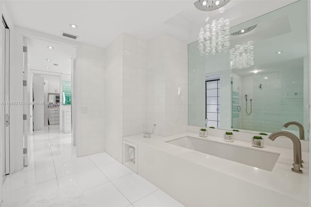 full bathroom with tile walls, visible vents, a stall shower, tile patterned flooring, and a bath