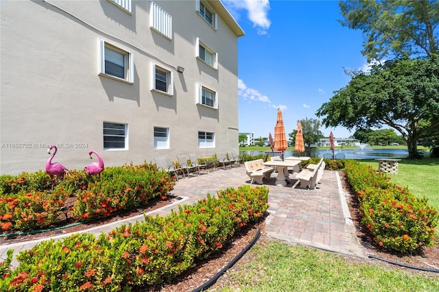 exterior space with a water view