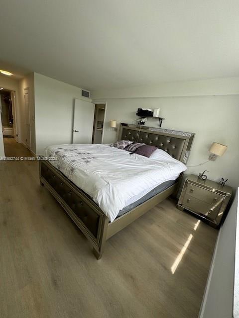 bedroom featuring hardwood / wood-style floors