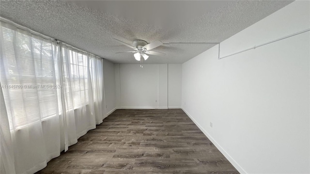 spare room featuring a textured ceiling, hardwood / wood-style flooring, and ceiling fan