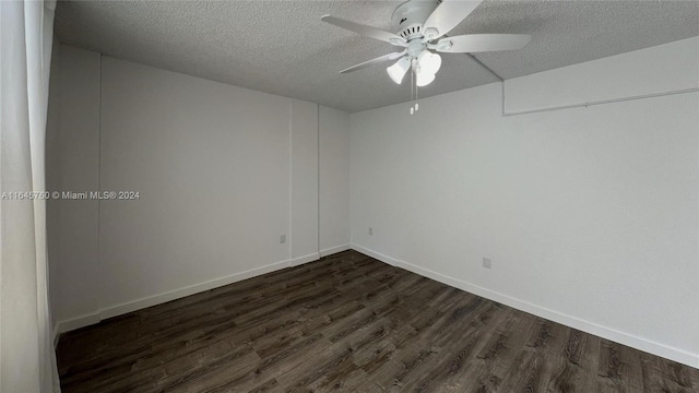 unfurnished room featuring dark wood-type flooring, ceiling fan, and a textured ceiling