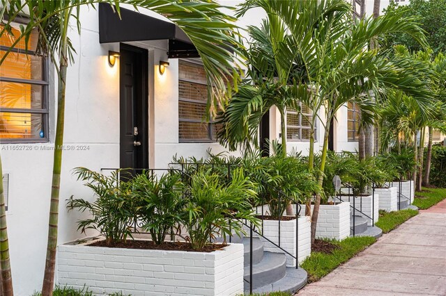 exterior space with stucco siding