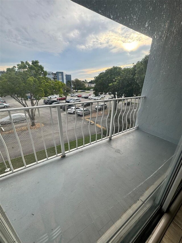 view of balcony at dusk