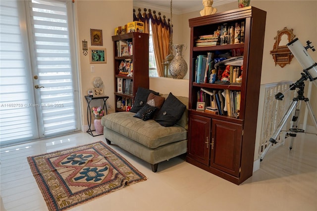 sitting room with crown molding