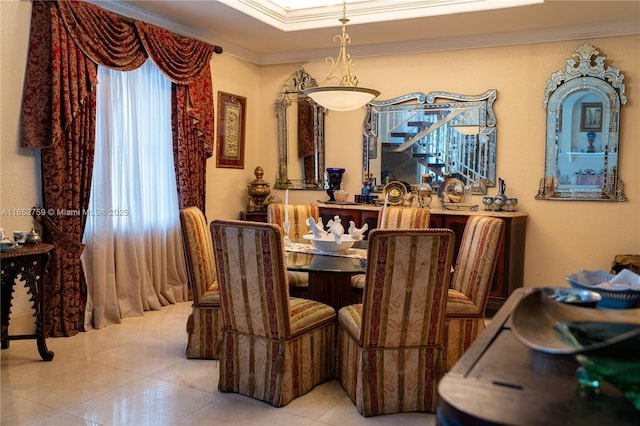 tiled dining room with crown molding