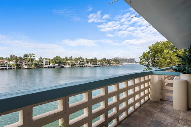 balcony featuring a water view