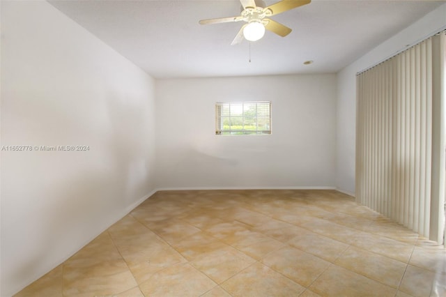 spare room featuring ceiling fan