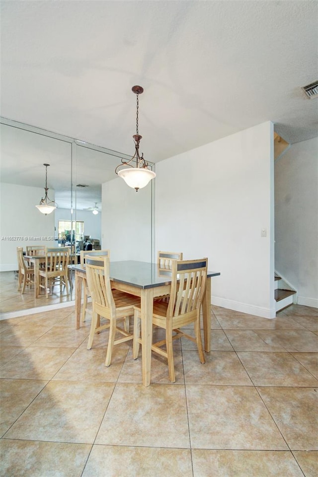 view of tiled dining room